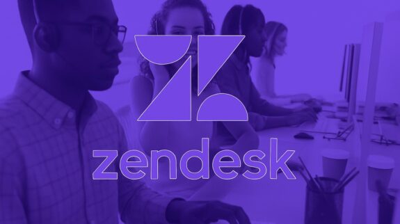 Zendesk: Tự Động Hóa Chăm Sóc Khách Hàng Logo Zendesk bao gồm bốn hình khối hình học tạo thành chữ Z cách điệu, phía dưới là tên thương hiệu zendesk viết thường.
